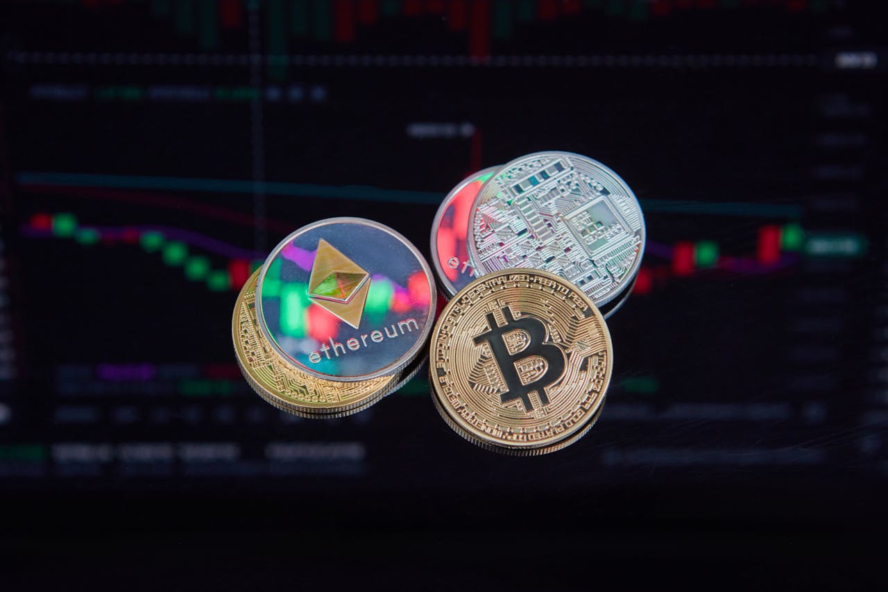 Floating Bitcoin and Ethereum coins with a market trend chart in the background symbolizing digital finance.